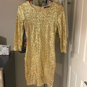 Gold sequin dress for the new year
